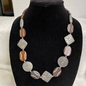 Carved stone necklace